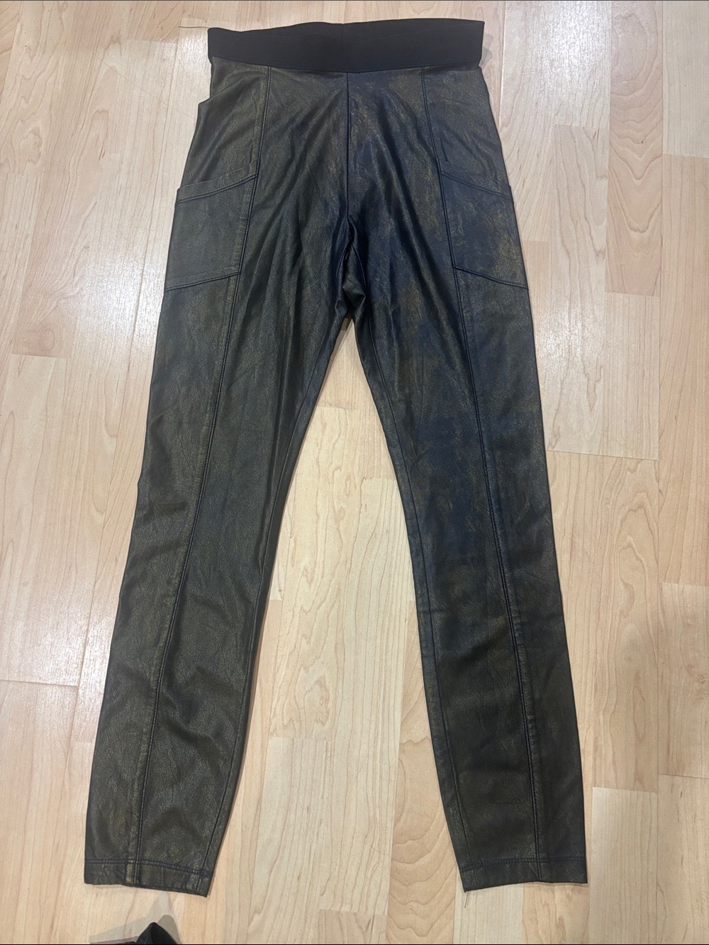BCBG women’s Black/Gold Faux Leather leggings No tags but never worn